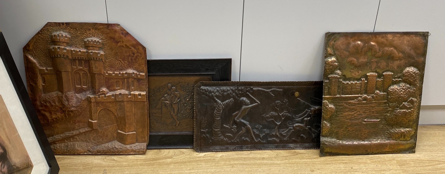 A selection of four copper display panels, to include ‘The GateTower, Herstmonceux’, another similar and two others